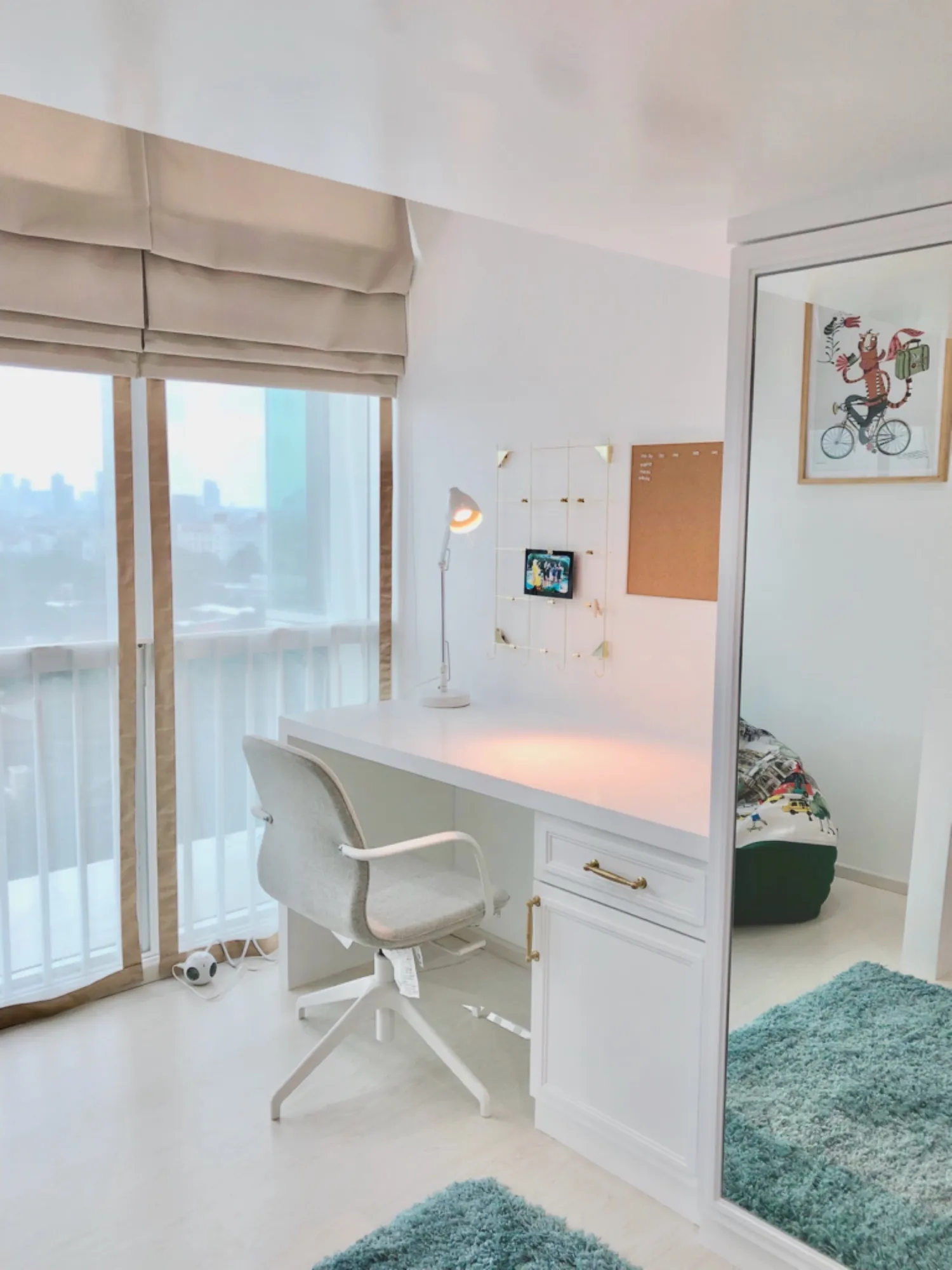 Bedroom with desk and balcony